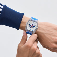 Laden Sie das Bild in den Galerie-Viewer, Adidas Unisex Uhr CITY TECH FIVE Kunststoff transparent AOFH26529