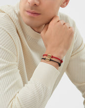 Laden Sie das Bild in den Galerie-Viewer, Philipp Plein Unisex Armband Textil Edelstahl gold PLEIN LETTERING PJ1AA32BU